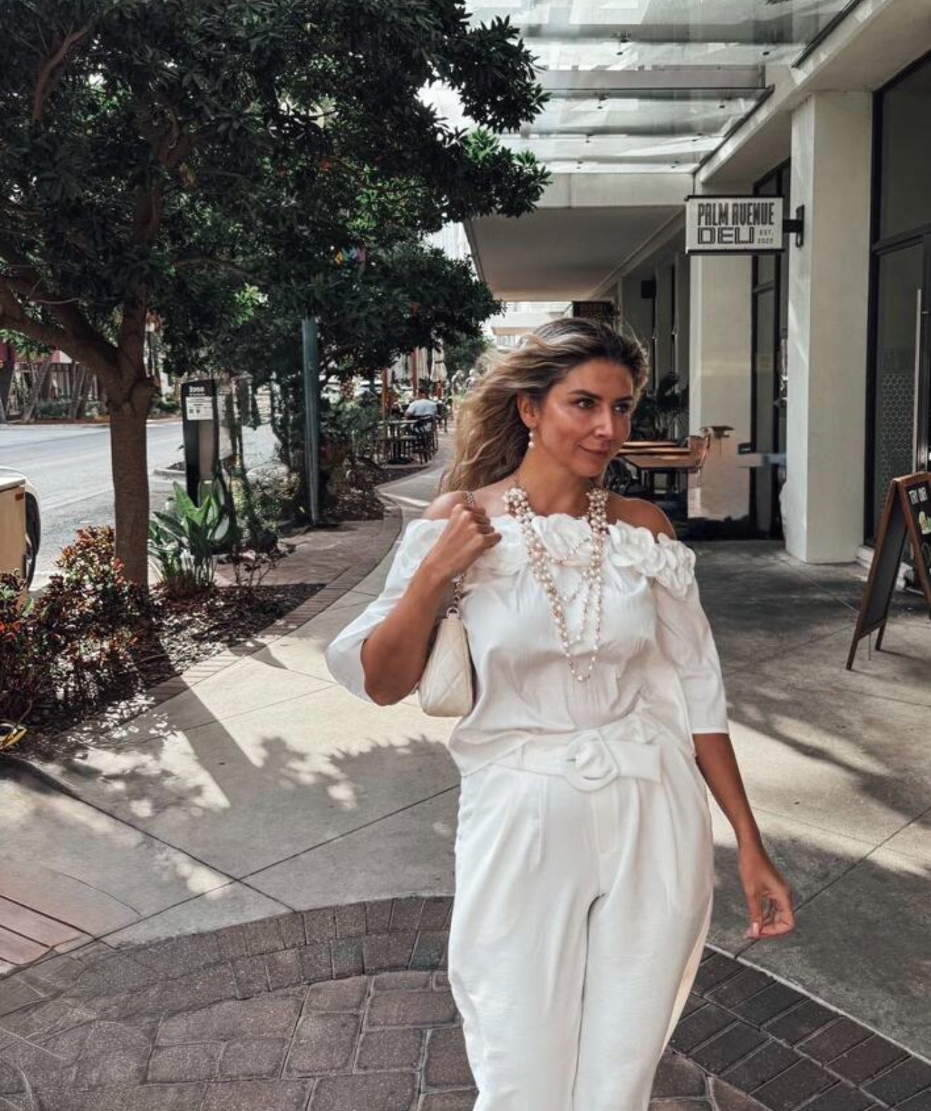 Bula Off-Shoulder Blouse with Flower Appliqué